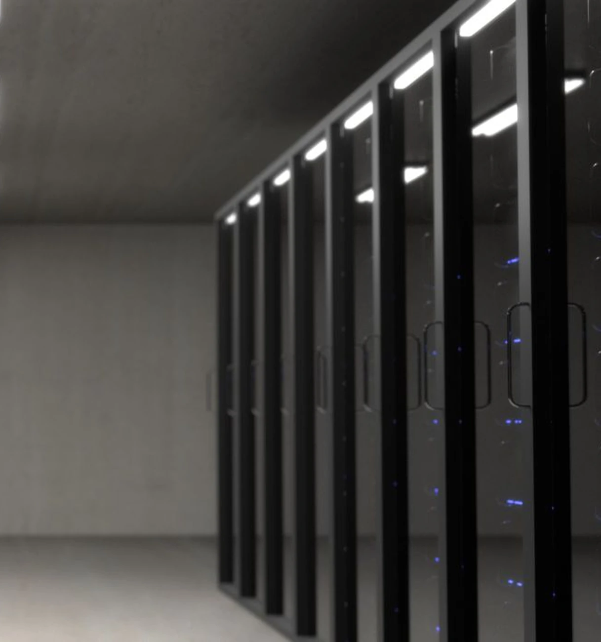 Rows of server racks illustrating a data centre commissioning environment